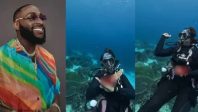 Lady causes a stir as she does Davido’s ‘unavailable’ challenge underwater (video)